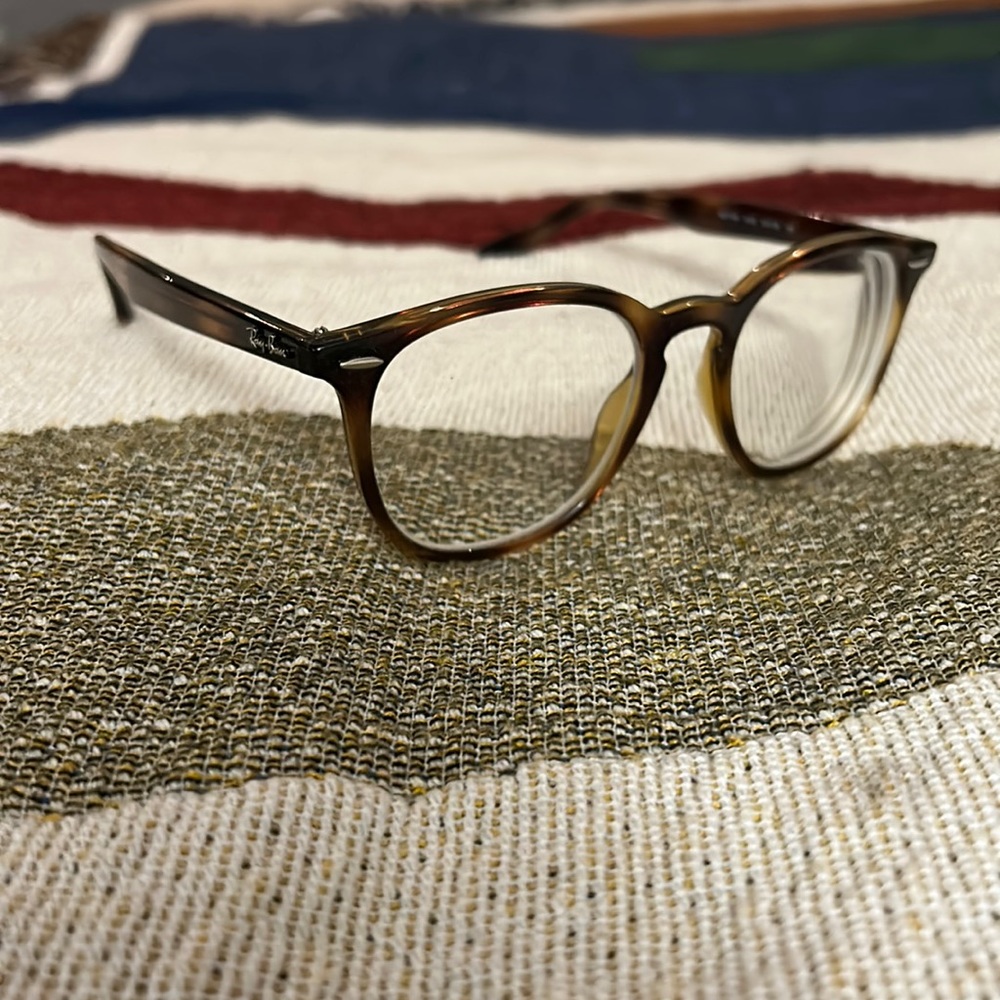 Ray ban glasses .